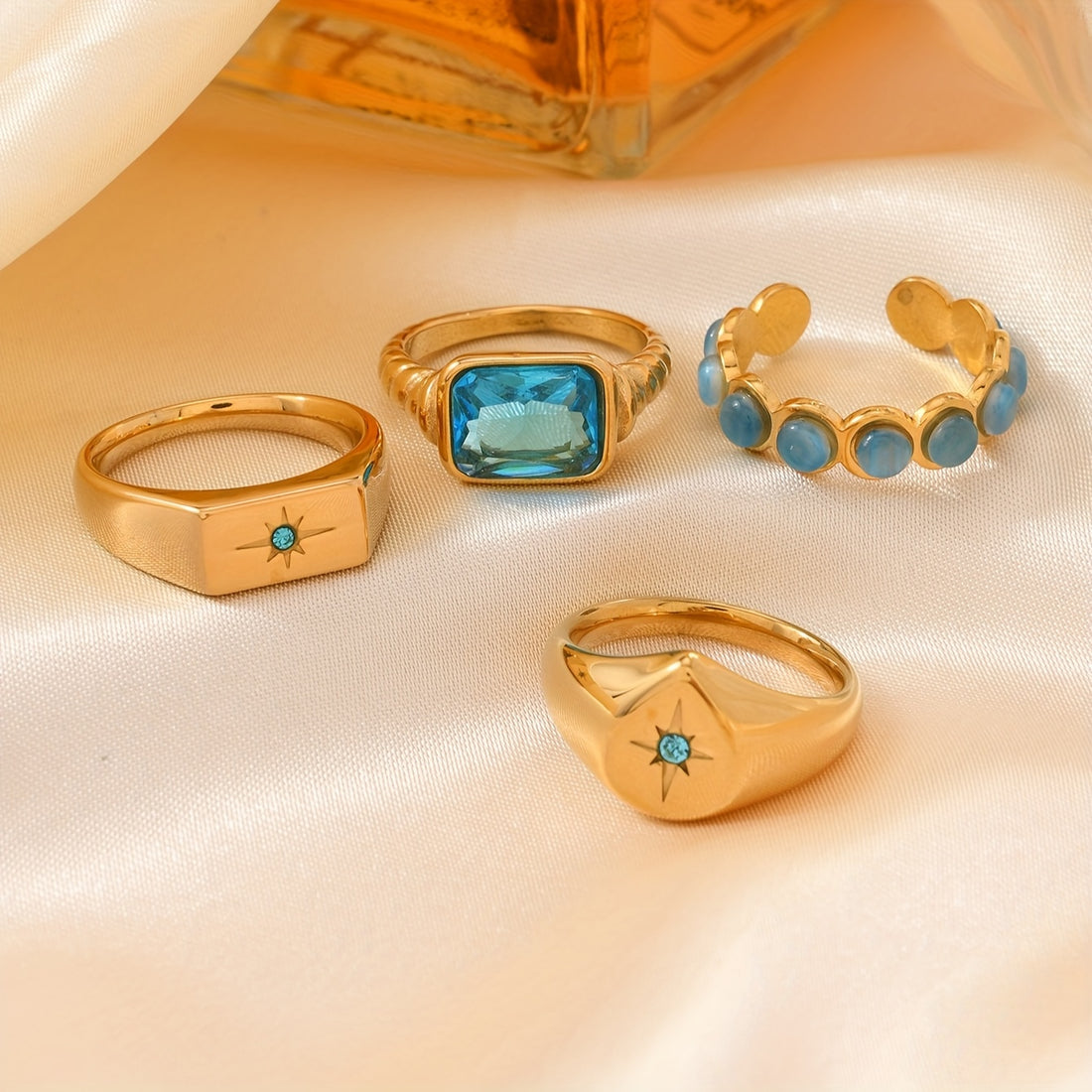 💍 Mavi Taşlı 4’lü Paslanmaz Çelik Yüzük Seti – Şık ve Günlük Uyum